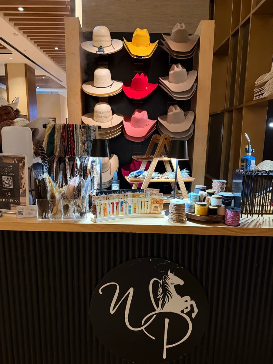 Wild Pony branded hat bar booth set up at a corporate event