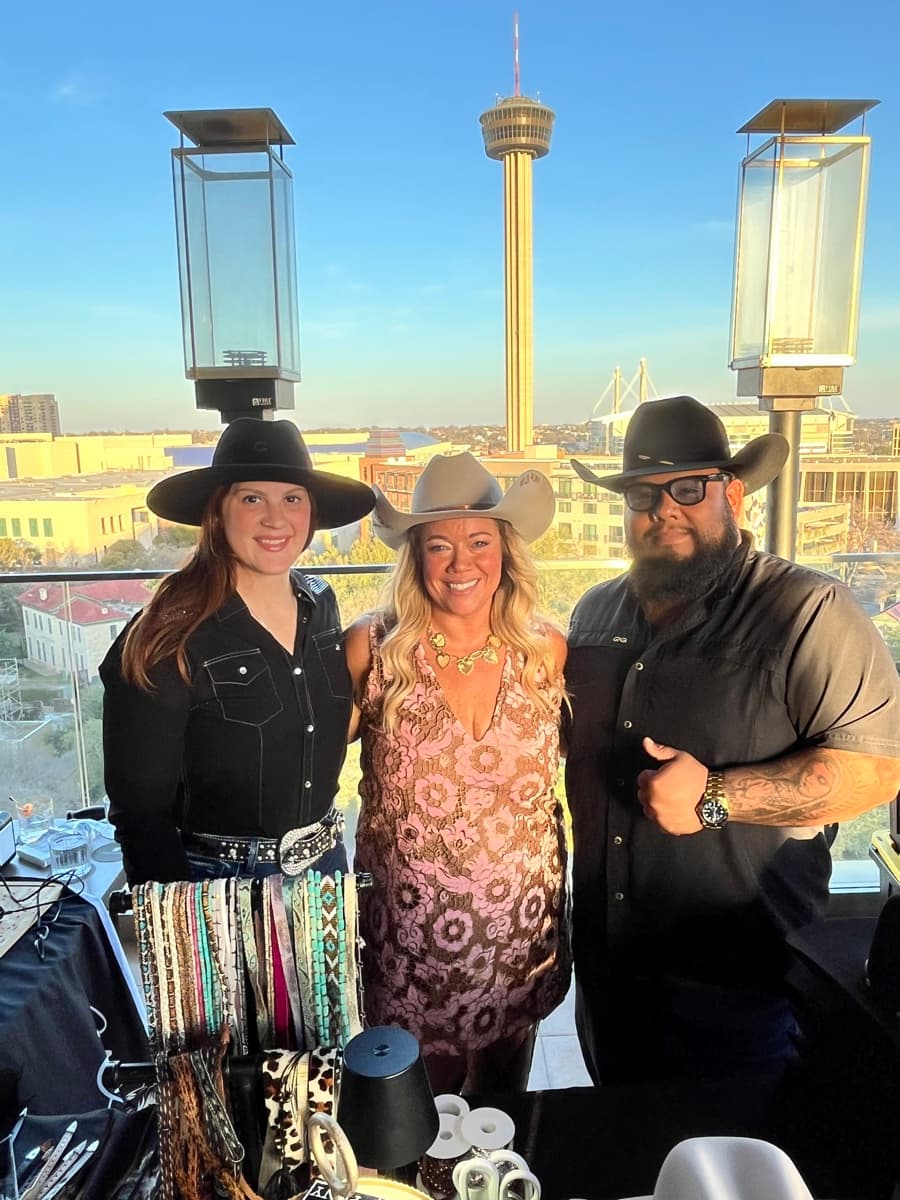 Wild Pony team with custom hats and the San Antonio skyline