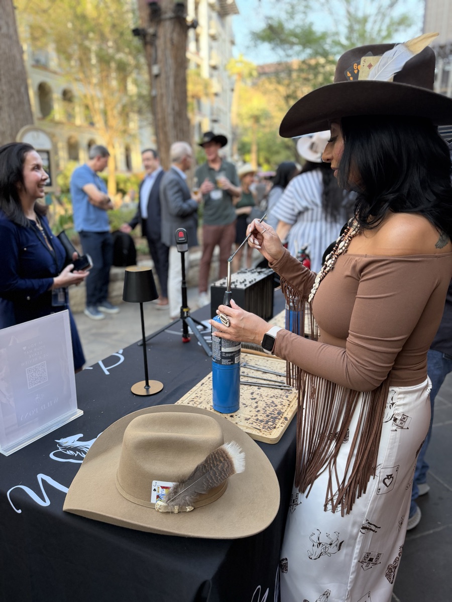 Guest customizing their own hat at the Wild Pony bar